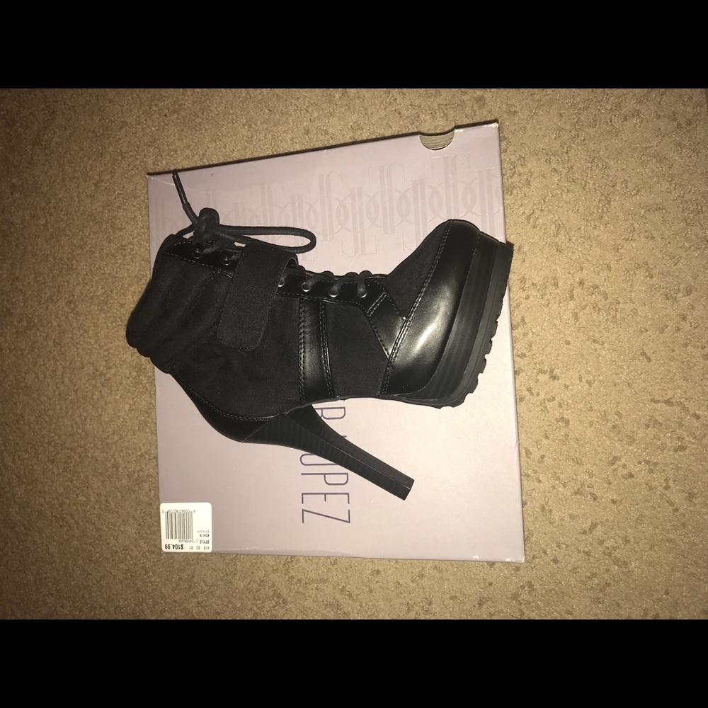 Jennifer Lopez black heeled boots